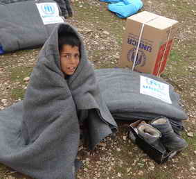 Un niño siriro en un campamento de ACNUR